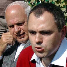 Mr Omar Abdullah, National Conference President, and former Chief Minister Farooq Abdullah at a press conference in Srinagar on Friday.