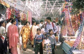 Shoppers� Stop: Shoppers throng the Sarojini Nagar market for Divali gifts on Friday.