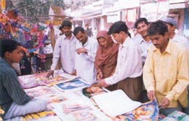 Customers at a calendar shop in Jhajjar