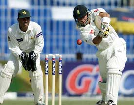 South African opener Herschelle Gibbs drives Pakistani spinner Danish Kaneria