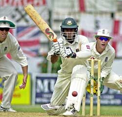 Bangladeshi batsman Hannan Sarkar attempts a paddle sweep 