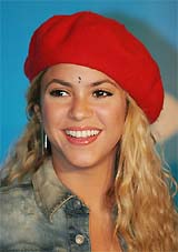 Colombian pop star Shakira poses after being named UNICEF Good Will Ambassador at a ceremony in Madrid