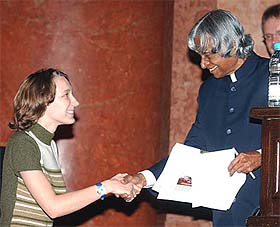Indian President A. P. J. Abdul Kalam receives a souvenir from a student of Sofia University in Sofia 