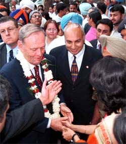 The Canadian Prime Minister, Mr Jean Chretien, and National Resources Minister Herb Dhaliwal arrive at the Canadian Consulate-General office in Chandigarh