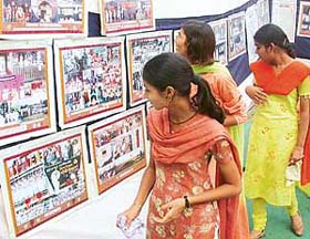 Visitors look at rare photographs of the late Laxmibai Kelkar, founder of the Rashtra Sevika Samiti, at Parshuram Bhavan in Sector 37, Chandigarh