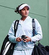 Tennis star Sania Mirza arrives at Lal Bahadur stadium for her semifinal match against Nigeria