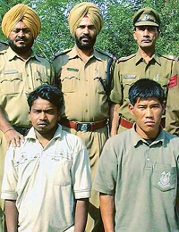 The two persons suspected of drugging and looting train passengers � in the custody of the Railway Police in Chandigarh on Monday.