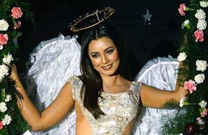 Bollywood star Mahima Chaudhary poses as an angel during a PETA advertising campaign to promote vegetarianism