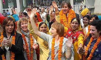 Teachers from the UK perform bhangra with students