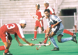 Orrisa and Jalandhar players in action during a match of 32nd Junior Nehru Hockey Tournament at Shivaji Stadium in the Capital on Tuesday.
