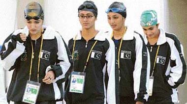 Pakistani swimmers Sana Wahid, Mahera Karim , Ayesha Tajwar (2-R) and Rubab Raza arrive for the women�s 4x100m freestyle relay at the 1st Afro-Asian Games