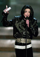 Michael Jackson speaks before accepting the Humanitarian Award at the 2003 Radio Music Awards show in Las Vegas