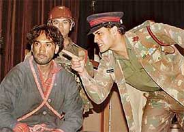 A scene from the play �Aprajit�