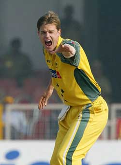 Australia�s Nathan Bracken reacts after scalping New Zealand�s Chris Nevin in the third one-dayer