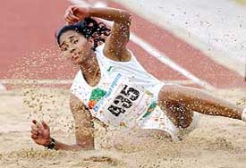 Anju Bobby George lands on sand during the women�s long jump event 