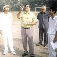 Sanjeev Madan during the toss with Surya Azad and Manav Sharma