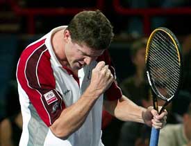 Jiri Novak of Czech Republic reacts during his match against Juan Carlos Ferrero of Spain in the third round of the ATP Masters Series in Paris 