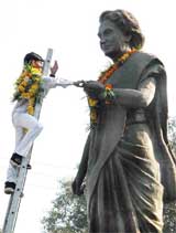 A Congress worker pays floral tributes to Indira Gandhi on her 19th death anniversary in Bhopal 