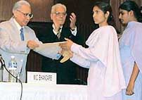 Students of Sanskrit Bharti High School, Haresinghpura, Karnal, receive citations from Chief Justice V.N. Khare 