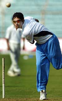 Yuvraj Singh bowls during a practice session in Mumbai on Friday