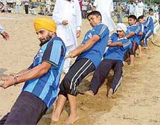 The team of Sri Har Rai Senior Secondary School, Sandhwan, Nawanshahr, in action in the tug of war