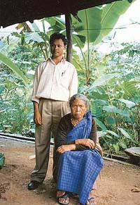 T. Kurba, a Mawpun village farmer, and her son
