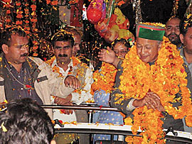 Chief Minister Virbhadra Singh crosses through the main bazar of Hamirpur on Saturday to inaugurate the three-day Hamir Utsav. 