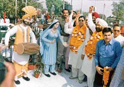 Mr Nahar Singh Gill, Mayor, and Mr Rakesh Pandey after the inauguration of a park