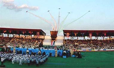 ndian Air Force's Surya Kiran aircrafts perform aerobatics over the BMC Balyogi Stadium during the closing ceremony of the first Afro Asian Games