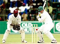 Zimbabwean captain Heath Streak cuts a delivery