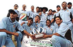 The victorious Indian team poses with the trophy in Lahore