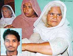 Grief-stricken Jagir Kaur (right), mother of Sukhdev Singh (inset), 22-year-old youth beaten to death at Mauli Baidwan village, SAS Nagar, on Saturday. 