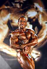 Newly crowned Mr Universe Rene Zimmermann from Switzerland strikes a pose at the Mr Universe contest in Mumbai 