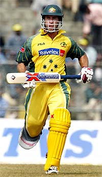 Australian batsman Michael Bevan takes a single during his unbeaten knock of 84