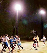 Basketball eves play at floodlit courts in the Sports Training Centre, Sector 18, Chandigarh.
