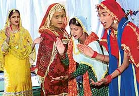 Students of Sarvhitkari Vidya Mandir Model High School, Sector 71, perform giddha at a function in SAS Nagar on Monday. 