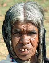 A Toda tribeswoman sports a hairstyle typical of her tribe in the Nilgiri Hills
