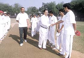 Frank Anthony School principal S Dacosta meeting players of the Kalka School