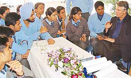 Mr Rendall Martin interacts with students of Vivek High School, Sector 38, Chandigarh, on Tuesday.