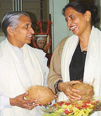 Dr Rama Rattan (left) and Ms Sukhwinder Amrit share a light moment after being conferred the Matru-Pitru Puraskar by Gadgil sisters at Punjab Kala Bhavan in Chandigarh on Tuesday. 