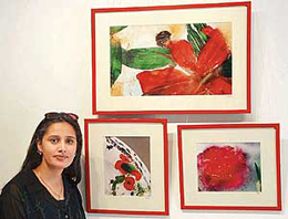 Madhu Pandit with her work at �Fragrance of Eternity� photo exhibition at Alliance Francaise in Sector 36, Chandigarh, on Tuesday.