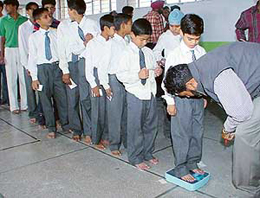 Karate players being weighed on the eve of the UT Inter-School Karate Meet at St. Joseph�s Senior Secondary School, Sector 44, Chandigarh, on Tuesday.