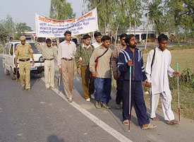 Members of the Netraheen Jagriti Sangh  march from Chandigarh to Delhi