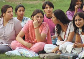Girls from Polar Cultures wait to showcase their wares at the IITF 2003, Pragati Maidan, in the Capital on Tuesday.