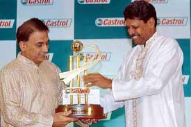 Sunil Gavaskar receives the Castrol Lifetime Achievement Award from former skipper Kapil Dev