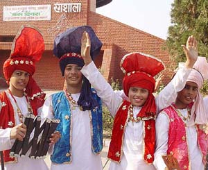 Students wait for their turn to perform at a cultural programme