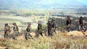 Army personnel patrol Bandipora hills