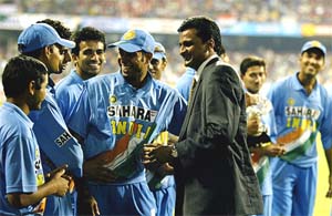 Members of the Indian cricket team share a light moment with Javagal Srinath in Bangalore