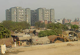 The mushrooming slums alongside the Housefed super deluxe flats complex on the Pakhowal Road in Ludhiana