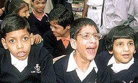 Differently abled children enjoying a fun ride, organised by the Indian Navy during the Navy Week 2003 at Appu Ghar in the Capital on Thursday. 